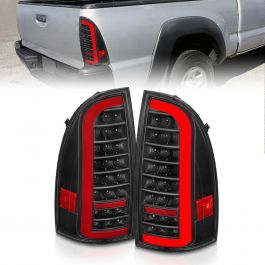 TOYOTA TACOMA 05-15 LED BAR STYLE TAIL LIGHTS BLACK CLEAR LENS W/  SEQUENTIAL SIGNAL