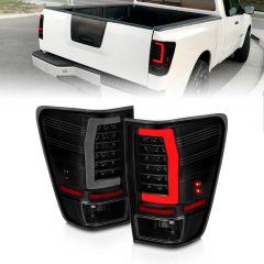 NISSAN TITAN 04-15 LED TAIL LIGHTS BLACK HOUSING SMOKED LENS W/ C LIGHT BAR (WITH OUT UTILITY COMPARTMENT)