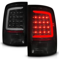 DODGE RAM 1500 09-18 / RAM 2500/3500 10-18 LED TAIL LIGHTS BLACK SMOKE LENS W/ SEQUENTIAL (NOT FOR OE LED TAIL LIGHT MODELS)