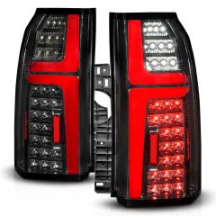 CHEVY TAHOE/SUBURBAN 15-20 FULL LED TAIL LIGHTS BLACK HOUSING CLEAR LENS W/ LIGHT BAR W/ SEQUENTIAL SIGNAL