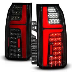 CHEVY TAHOE/SUBURBAN 15-20 FULL LED TAIL LIGHTS BLACK HOUSING SMOKE LENS W/ LIGHT BAR W/ SEQUENTIAL SIGNAL